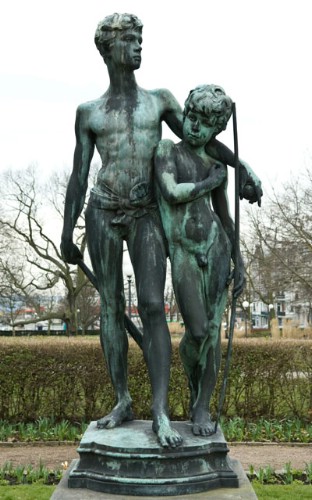 sculpture of a boy and a man